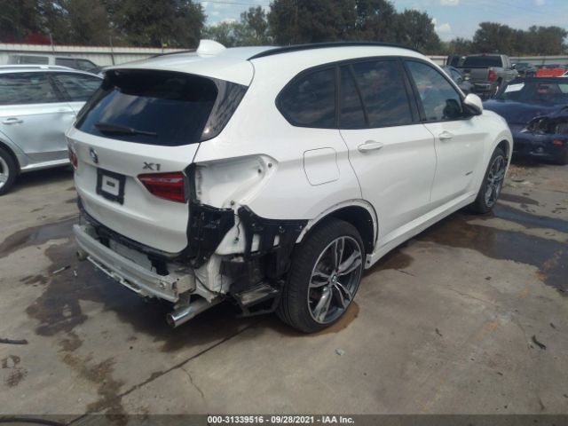 Photo 3 VIN: WBXHU7C31J5L05195 - BMW X1 