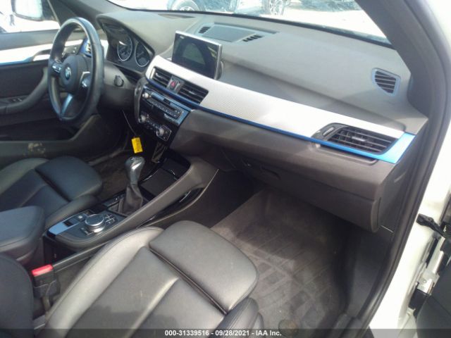 Photo 4 VIN: WBXHU7C31J5L05195 - BMW X1 