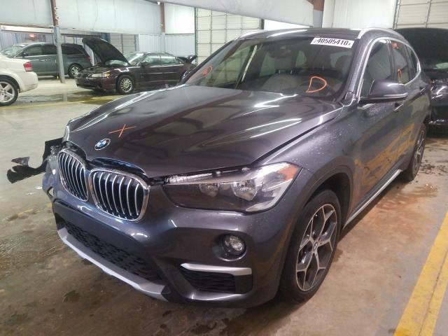 Photo 1 VIN: WBXHU7C31J5L05813 - BMW X1 