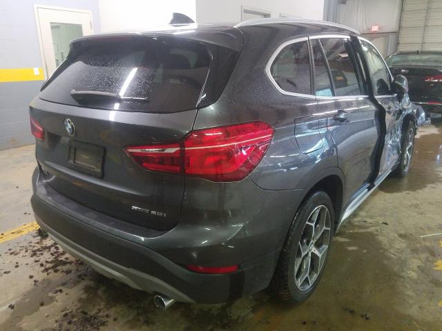 Photo 3 VIN: WBXHU7C31J5L05813 - BMW X1 