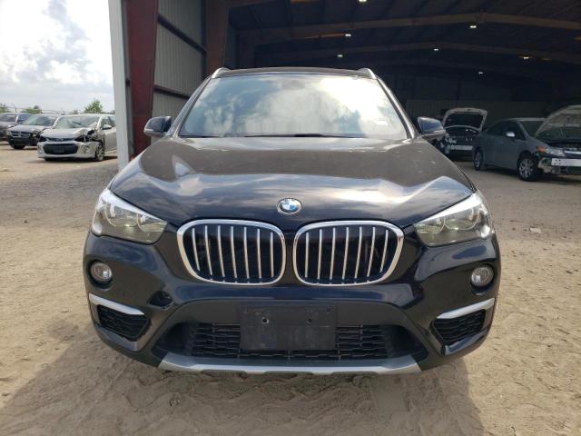 Photo 4 VIN: WBXHU7C31J5L06671 - BMW X1 