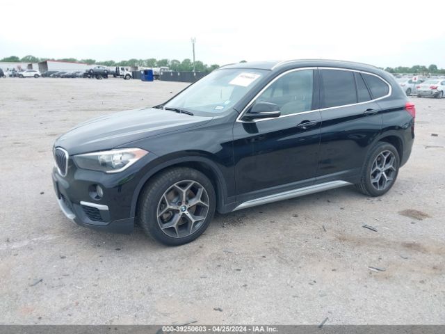 Photo 1 VIN: WBXHU7C31J5L07822 - BMW X1 