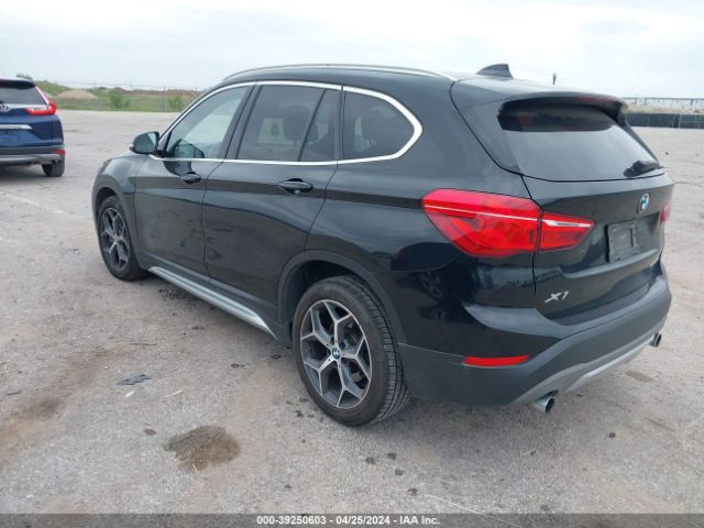 Photo 2 VIN: WBXHU7C31J5L07822 - BMW X1 