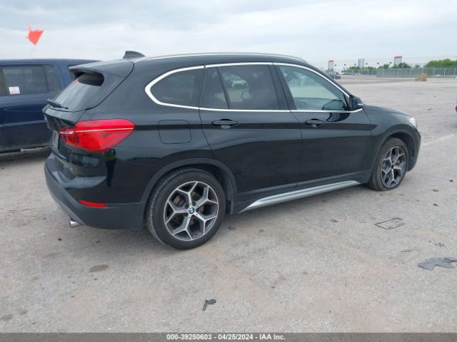 Photo 3 VIN: WBXHU7C31J5L07822 - BMW X1 