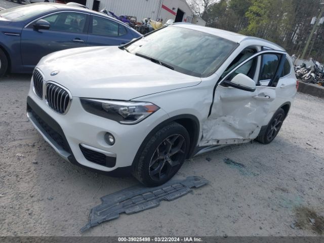 Photo 1 VIN: WBXHU7C31J5L08999 - BMW X1 