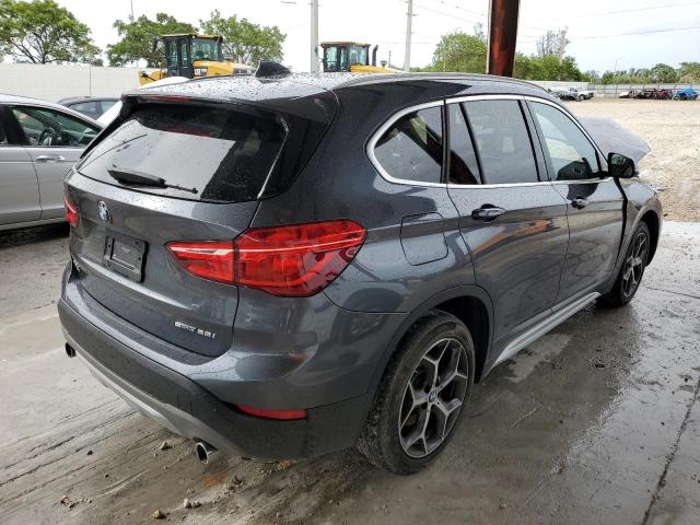 Photo 3 VIN: WBXHU7C31J5L09716 - BMW X1 