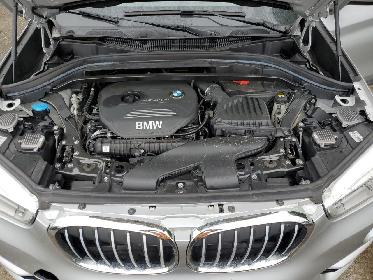 Photo 10 VIN: WBXHU7C32H5D71607 - BMW X1 