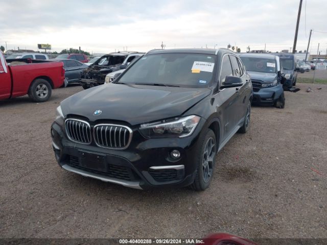 Photo 1 VIN: WBXHU7C32H5H33659 - BMW X1 