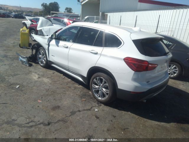 Photo 2 VIN: WBXHU7C32H5H37002 - BMW X1 