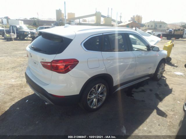 Photo 3 VIN: WBXHU7C32H5H37002 - BMW X1 