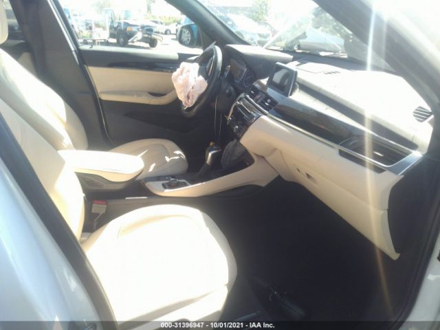 Photo 4 VIN: WBXHU7C32H5H37002 - BMW X1 