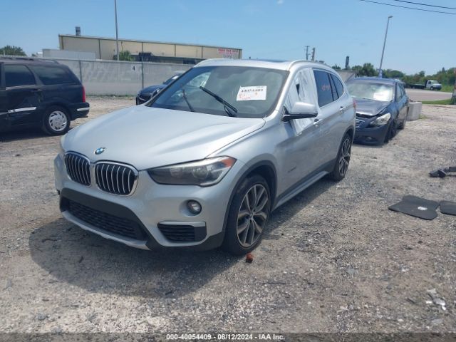 Photo 1 VIN: WBXHU7C32H5H37484 - BMW X1 