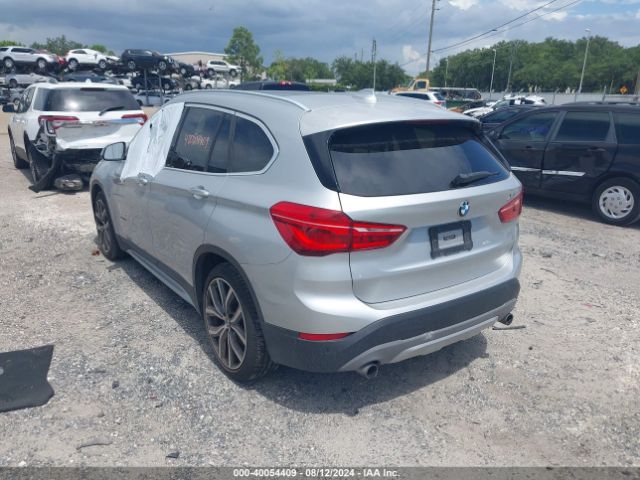 Photo 2 VIN: WBXHU7C32H5H37484 - BMW X1 