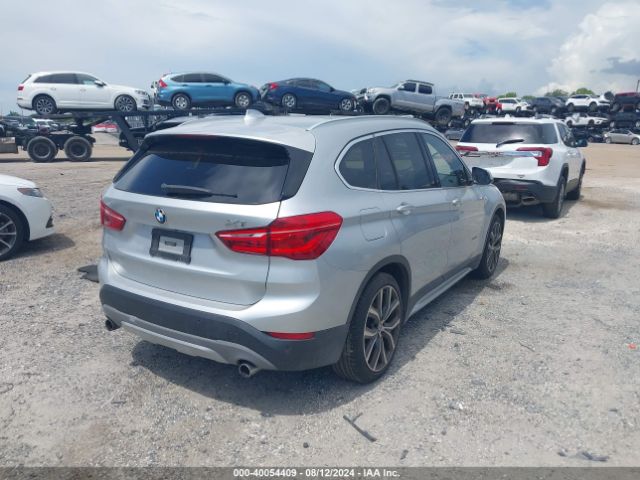 Photo 3 VIN: WBXHU7C32H5H37484 - BMW X1 