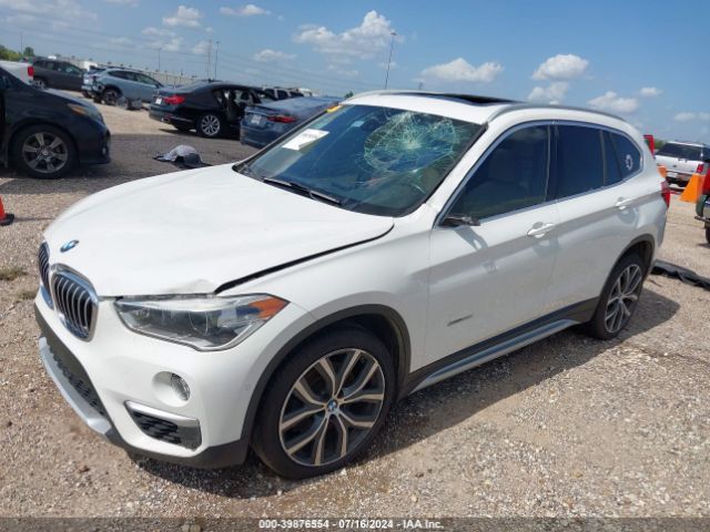 Photo 1 VIN: WBXHU7C32H5H38084 - BMW X1 