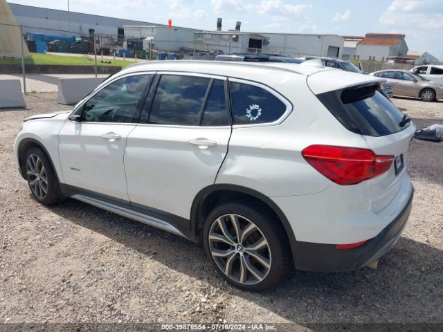 Photo 2 VIN: WBXHU7C32H5H38084 - BMW X1 