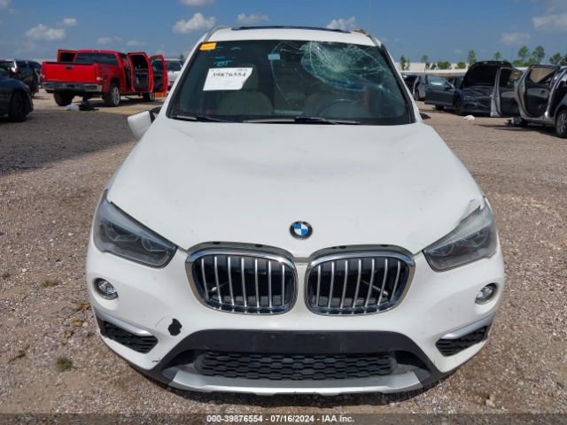 Photo 5 VIN: WBXHU7C32H5H38084 - BMW X1 