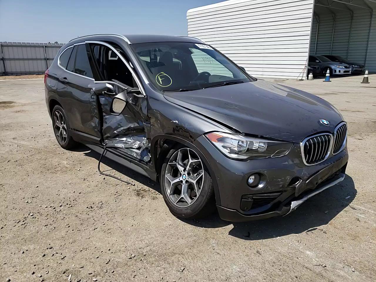 Photo 10 VIN: WBXHU7C32J3H42878 - BMW X1 SDRIVE2 