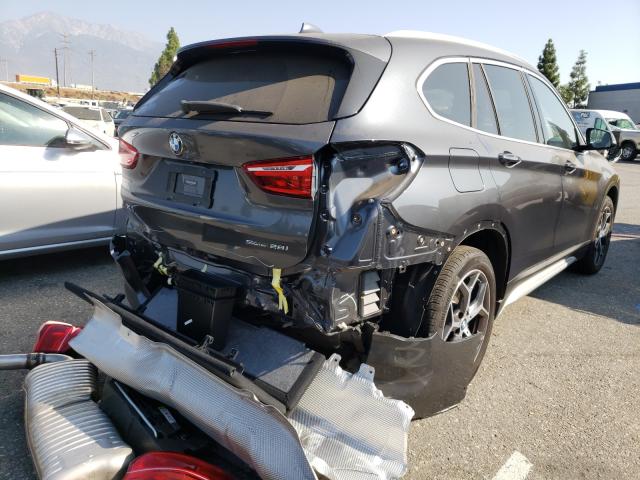 Photo 3 VIN: WBXHU7C32J3H43934 - BMW X1 