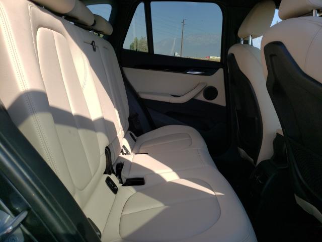 Photo 5 VIN: WBXHU7C32J3H43934 - BMW X1 