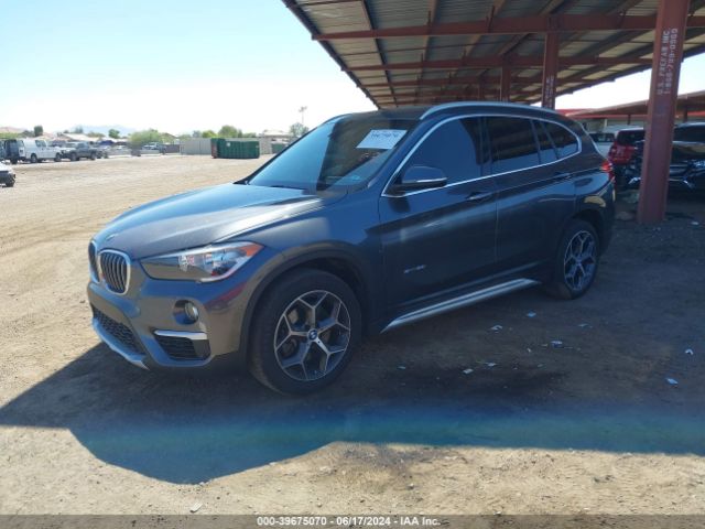 Photo 1 VIN: WBXHU7C32J5H38964 - BMW X1 