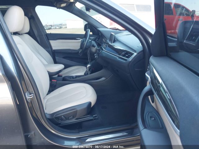 Photo 4 VIN: WBXHU7C32J5H38964 - BMW X1 