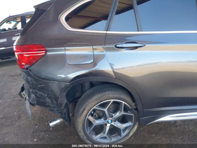 Photo 5 VIN: WBXHU7C32J5H38964 - BMW X1 