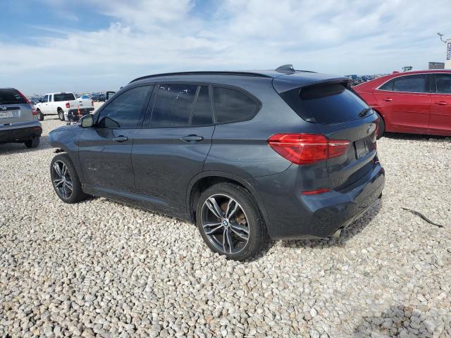 Photo 1 VIN: WBXHU7C32J5H40570 - BMW X1 