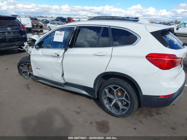 Photo 2 VIN: WBXHU7C32J5H40679 - BMW X1 