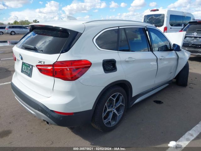 Photo 3 VIN: WBXHU7C32J5H40679 - BMW X1 