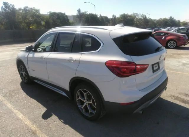 Photo 2 VIN: WBXHU7C32J5H41024 - BMW X1 