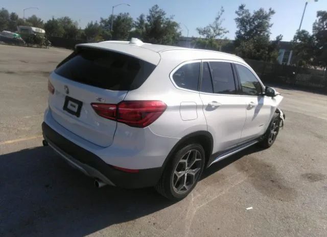 Photo 3 VIN: WBXHU7C32J5H41024 - BMW X1 