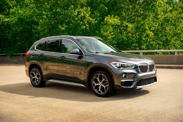 Photo 4 VIN: WBXHU7C32J5H41055 - BMW X1 