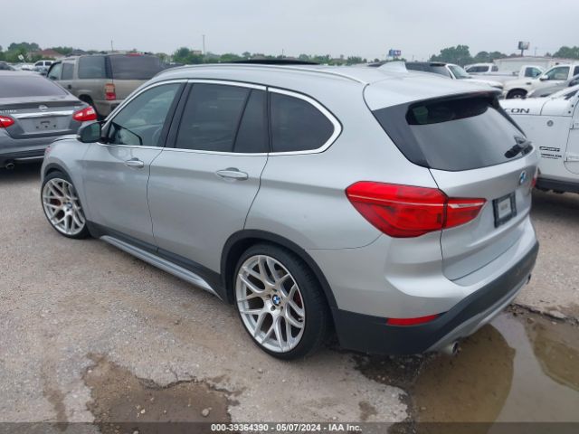 Photo 2 VIN: WBXHU7C32J5H41847 - BMW X1 