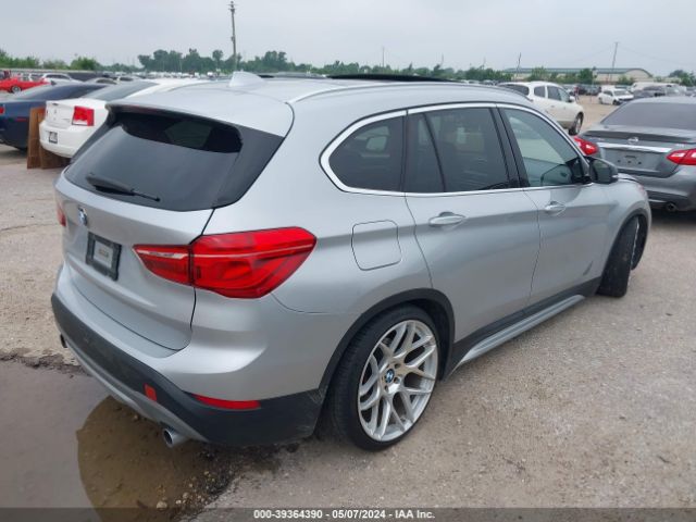 Photo 3 VIN: WBXHU7C32J5H41847 - BMW X1 