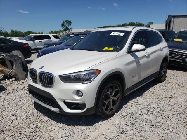 Photo 1 VIN: WBXHU7C32J5H42061 - BMW X1 SDRIVE2 