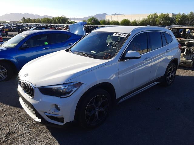 Photo 1 VIN: WBXHU7C32J5H42299 - BMW X1 SDRIVE2 