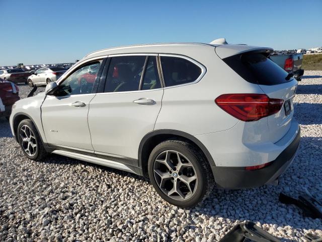 Photo 1 VIN: WBXHU7C32J5H43226 - BMW X1 