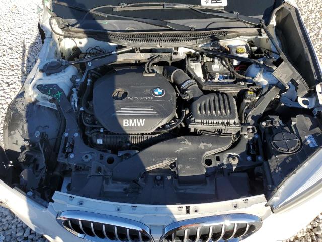 Photo 10 VIN: WBXHU7C32J5H43226 - BMW X1 