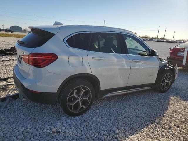 Photo 2 VIN: WBXHU7C32J5H43226 - BMW X1 