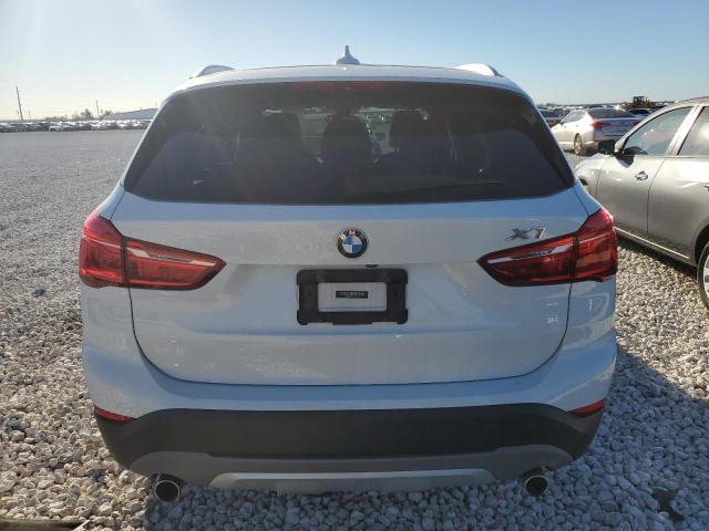 Photo 5 VIN: WBXHU7C32J5H43226 - BMW X1 