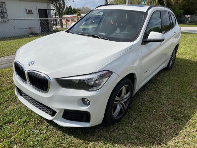 Photo 1 VIN: WBXHU7C32J5H44733 - BMW X1 