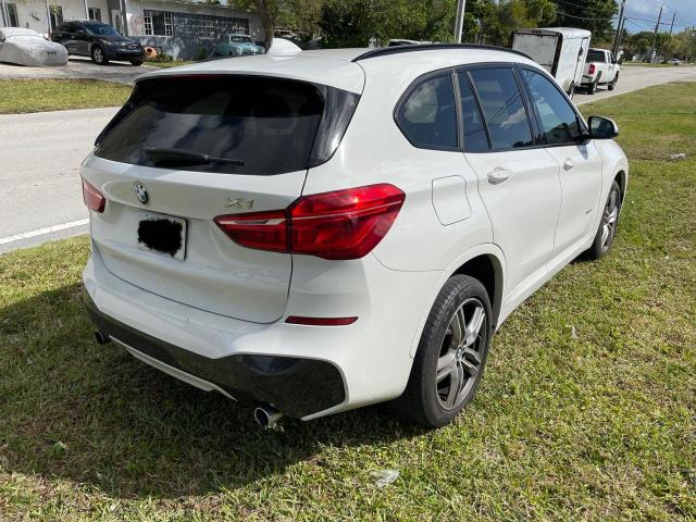 Photo 3 VIN: WBXHU7C32J5H44733 - BMW X1 