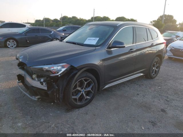 Photo 1 VIN: WBXHU7C32J5L08915 - BMW X1 