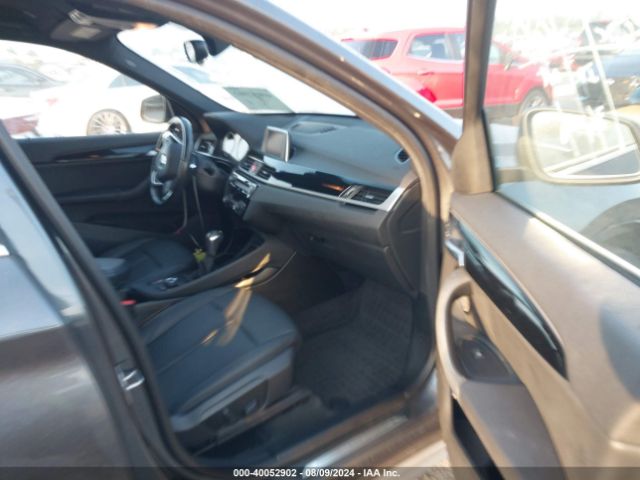 Photo 4 VIN: WBXHU7C32J5L08915 - BMW X1 