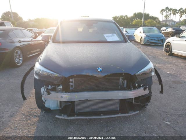 Photo 5 VIN: WBXHU7C32J5L08915 - BMW X1 