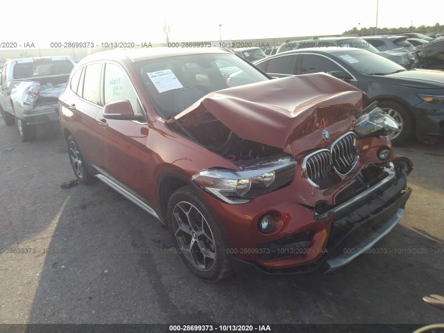 Photo 0 VIN: WBXHU7C32J5L08977 - BMW X1 