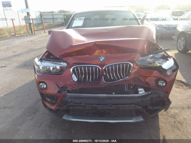 Photo 5 VIN: WBXHU7C32J5L08977 - BMW X1 