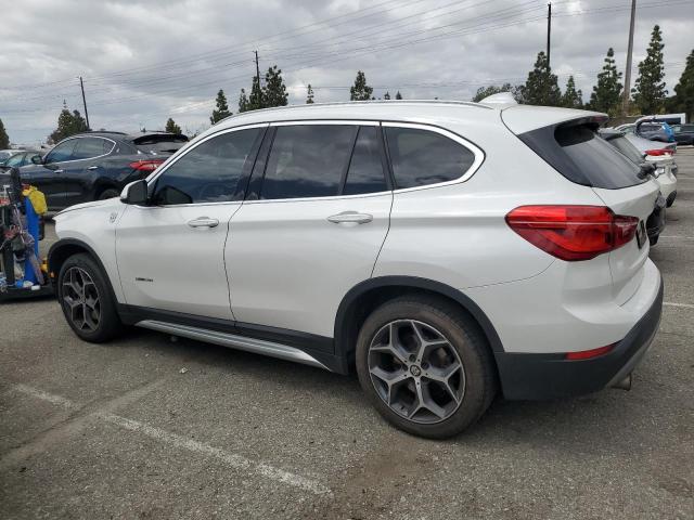 Photo 1 VIN: WBXHU7C33H5H34402 - BMW X1 