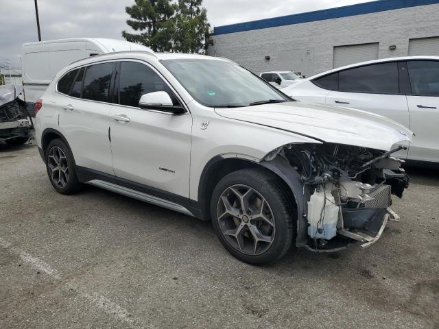 Photo 3 VIN: WBXHU7C33H5H34402 - BMW X1 